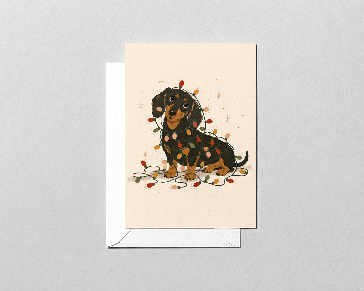 Dachshund Christmas Card – Wiener Dog Tangled in Lights